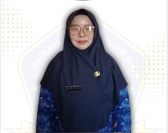 Elis Wartini, S.Pd